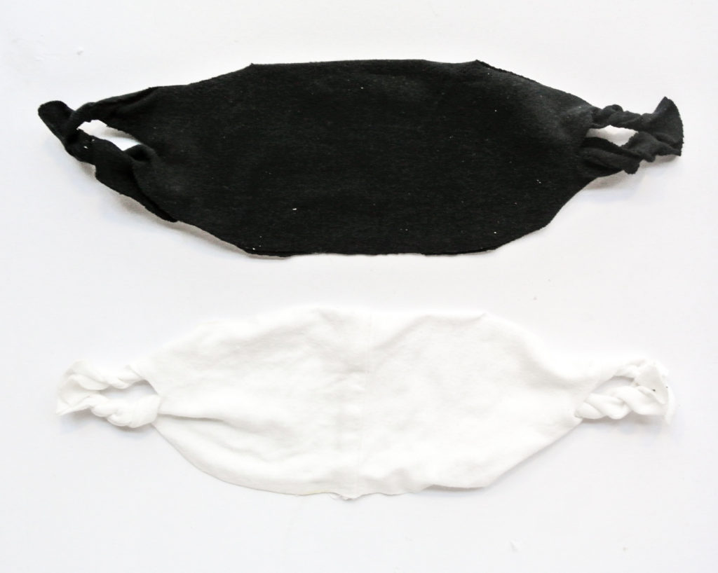 Finished No Sew Face Masks, top one made from black t-shirt, bottom one made from white t-shirt