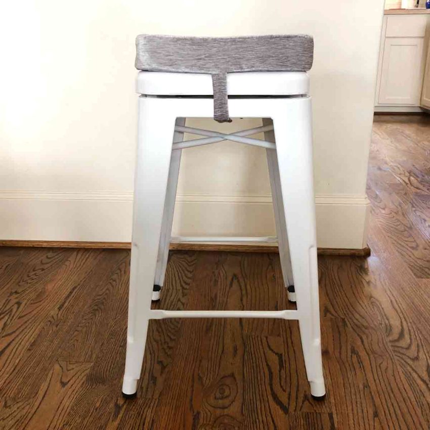 Shows bar stool with a removable bar stool cushion finished view