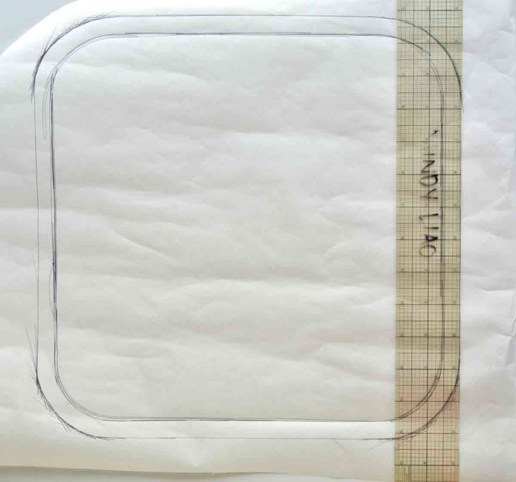Traced pattern with 1/2" seam allowance added with clear ruler. How to make square bar stool cushions with ties tutorial
