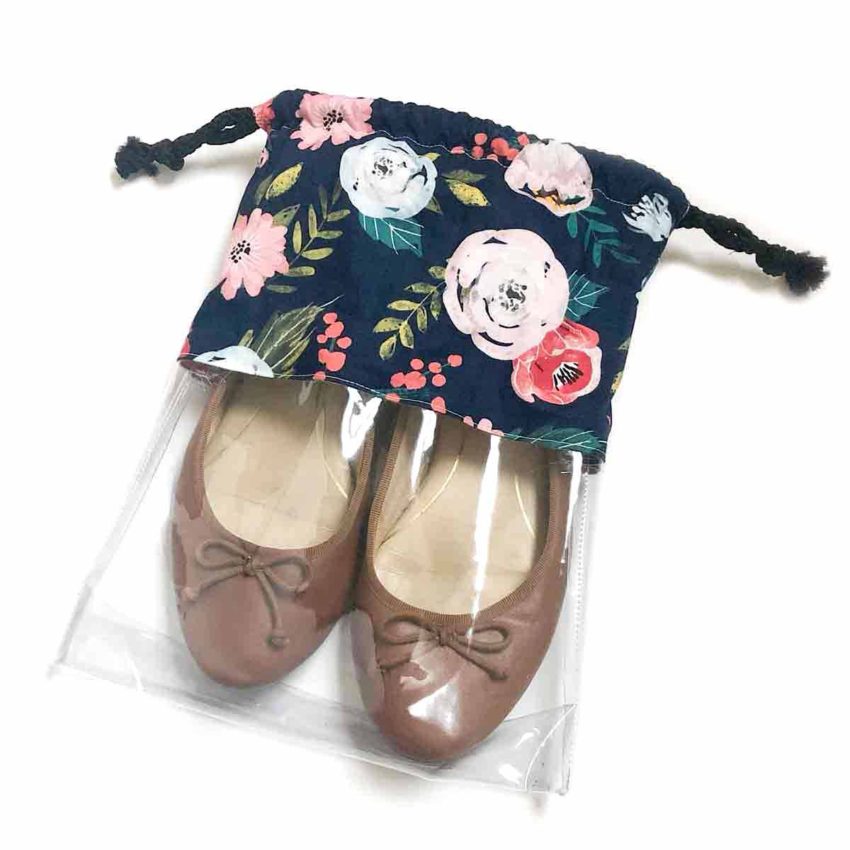 Shows Finished Medium Sized Drawstring Shoe Bag with a pair of ballet flats inside