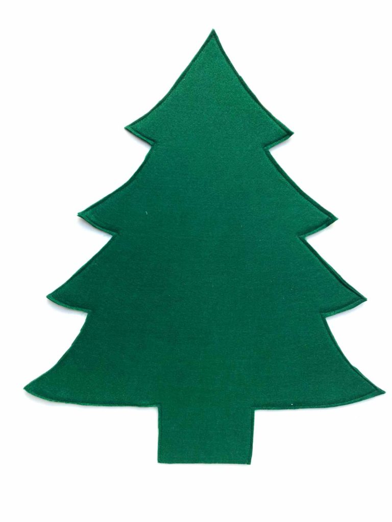 How to make a 3D Felt Christmas Tree with Free Printable pattern. Shows 1 piece of felt tree piece completed. 