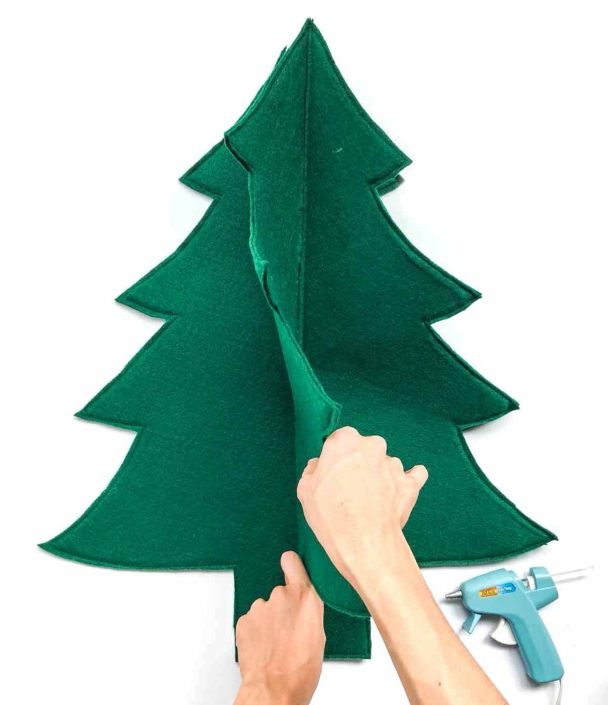 How to make a 3D Felt Christmas Tree with Free Printable pattern. Gluing felt tree pieces together using glue gun