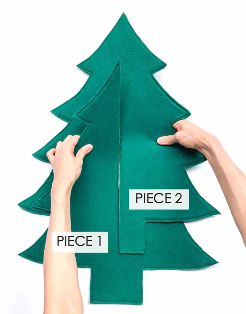How to make a 3D Felt Christmas Tree with Free Printable pattern. Placing felt tree pieces together at slit