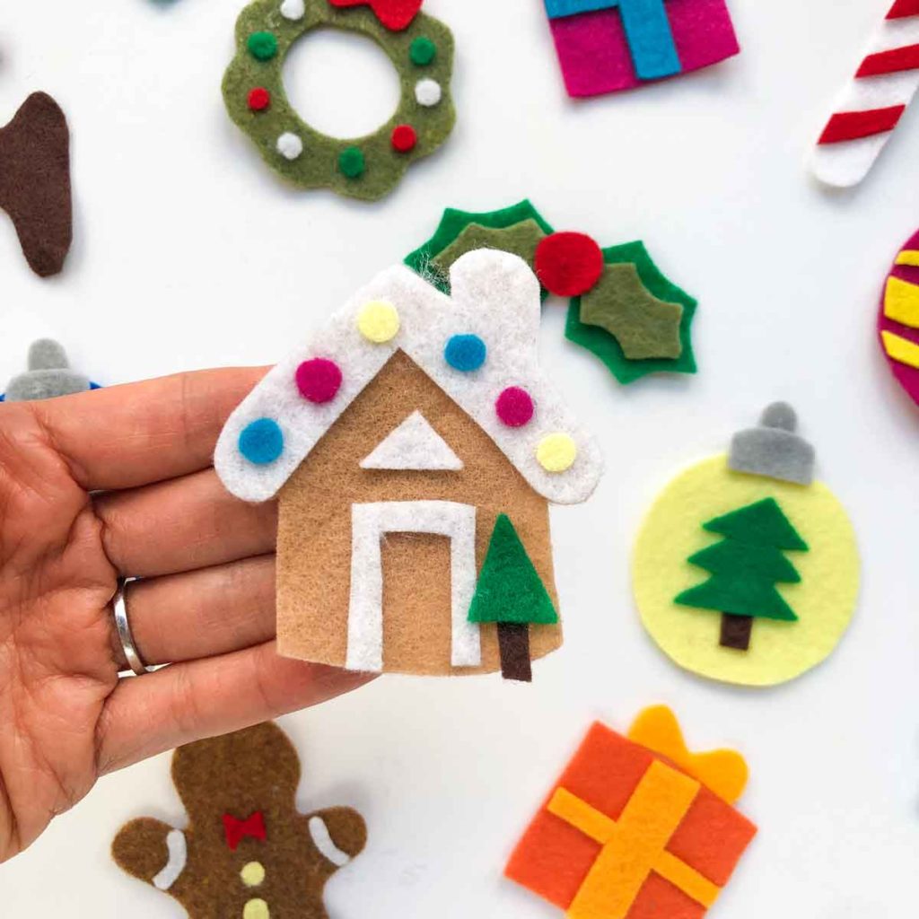 How to make a 3D Felt Christmas tree with free pattern. Shows closeup of gingerbread house no sew felt ornament