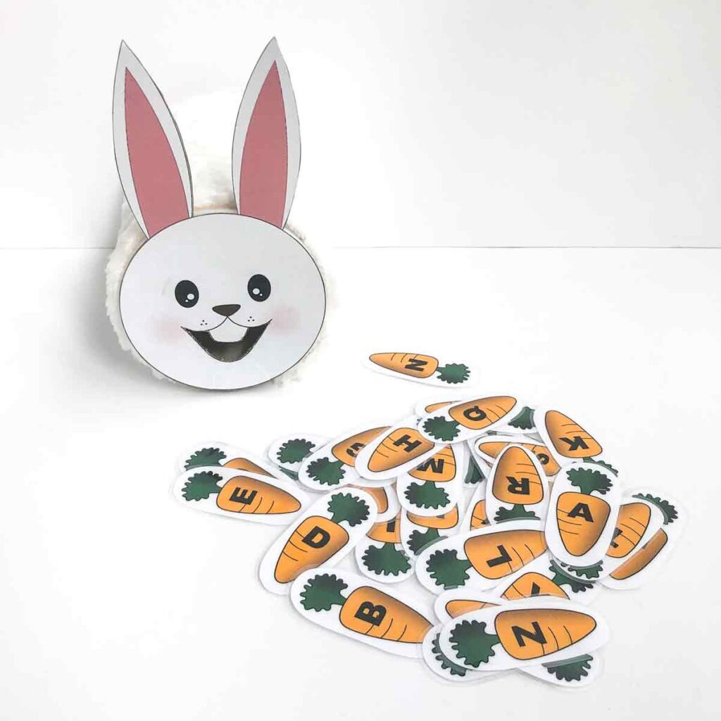 Feed the Bunny fun alphabet activity for kindergarten. Shows finished bunny and laminated carrot letters