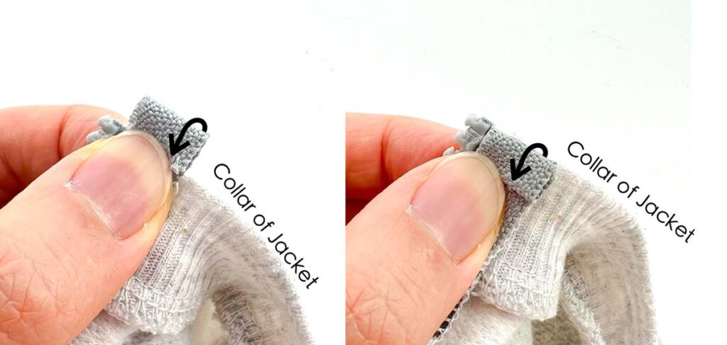 Folding top of zipper fabric down so that it's flushed with jacket collar