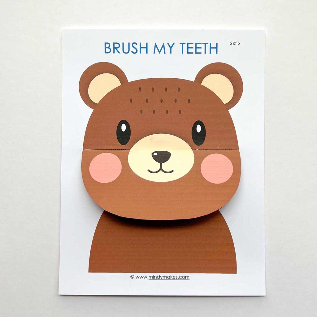 Mr Bear Lift-a-Flap Tooth Brushing Activity finished with flap down. Dental health activities for preschoolers