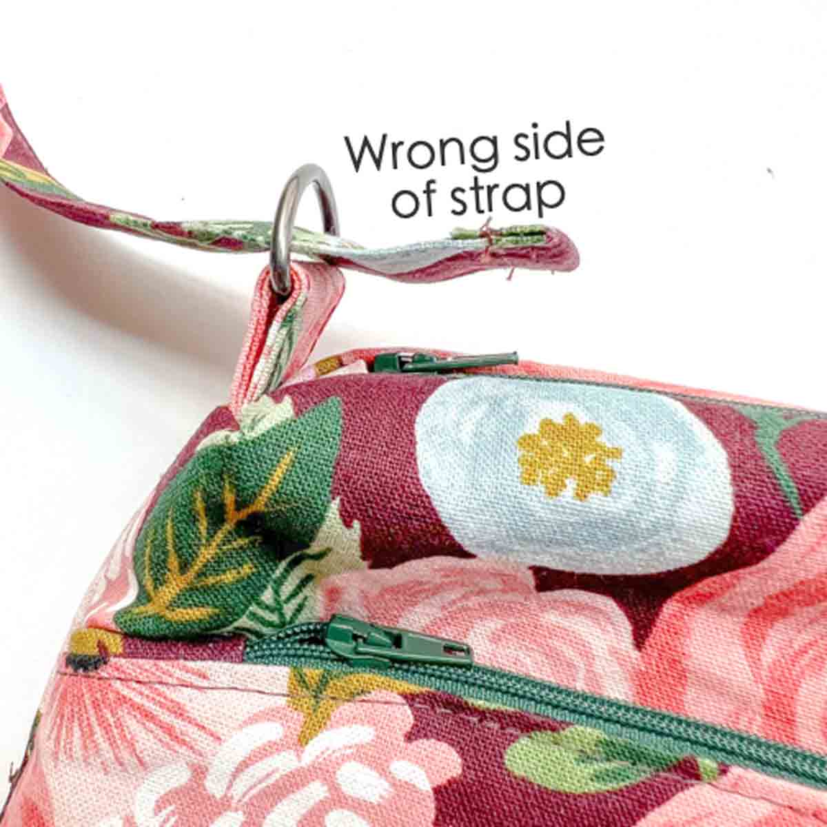 thread wrong side of bag strap into other D loop of bag. crossbody bag pattern