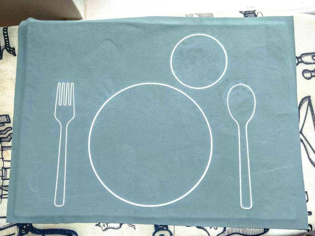 montessori placemat with table setting ironed on to fabric