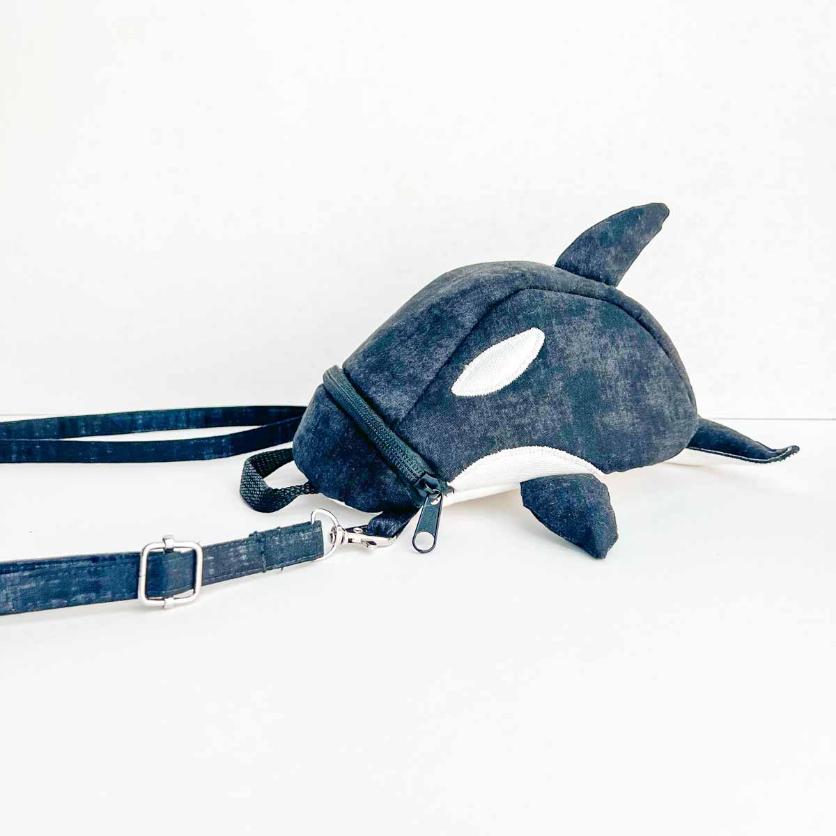 adjustable bag strap attached to orca bag