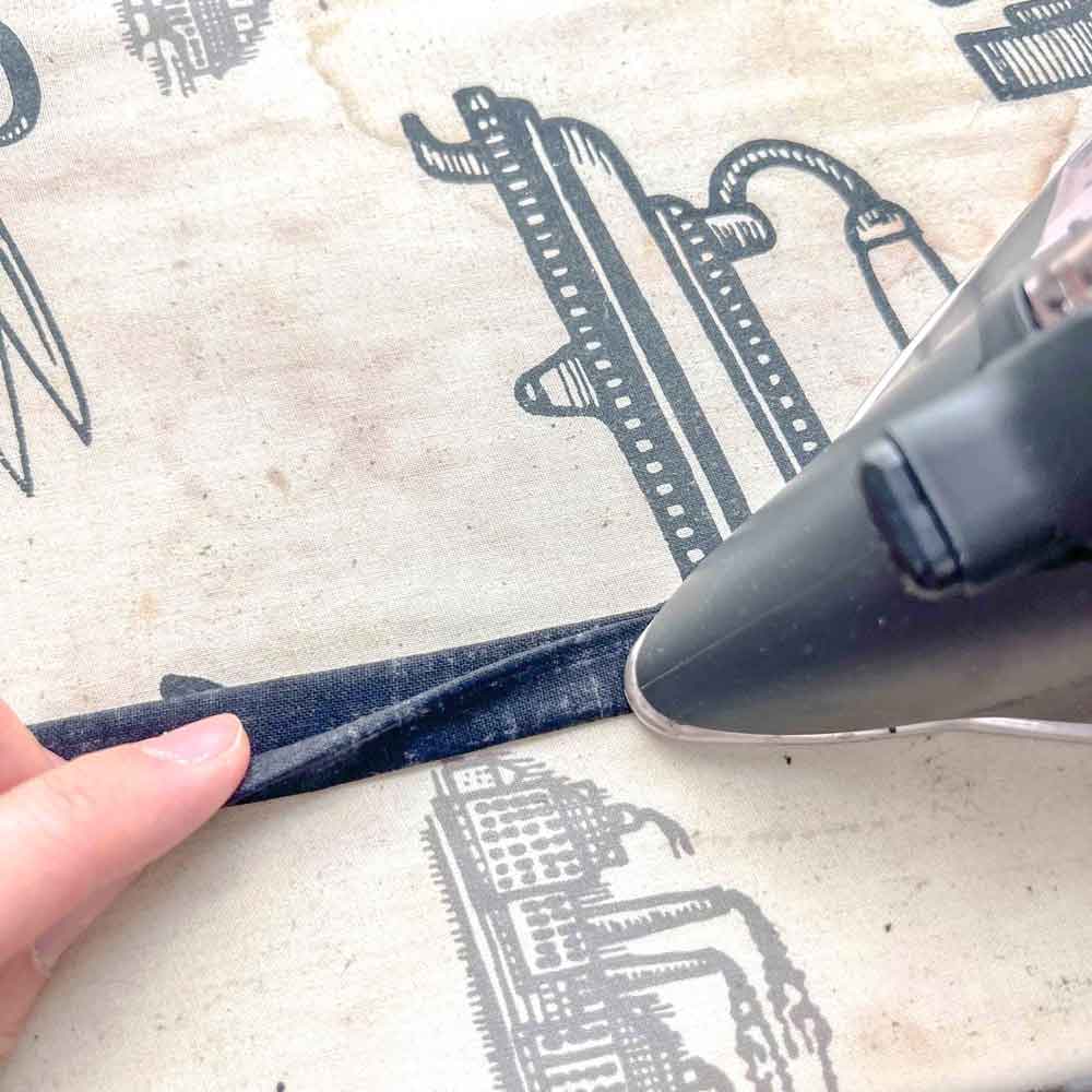 folding fabric strip in half and pressing