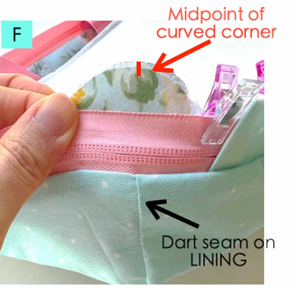 matching dart seam on lining of bottom piece with midpoint of curved corner on lid piece
