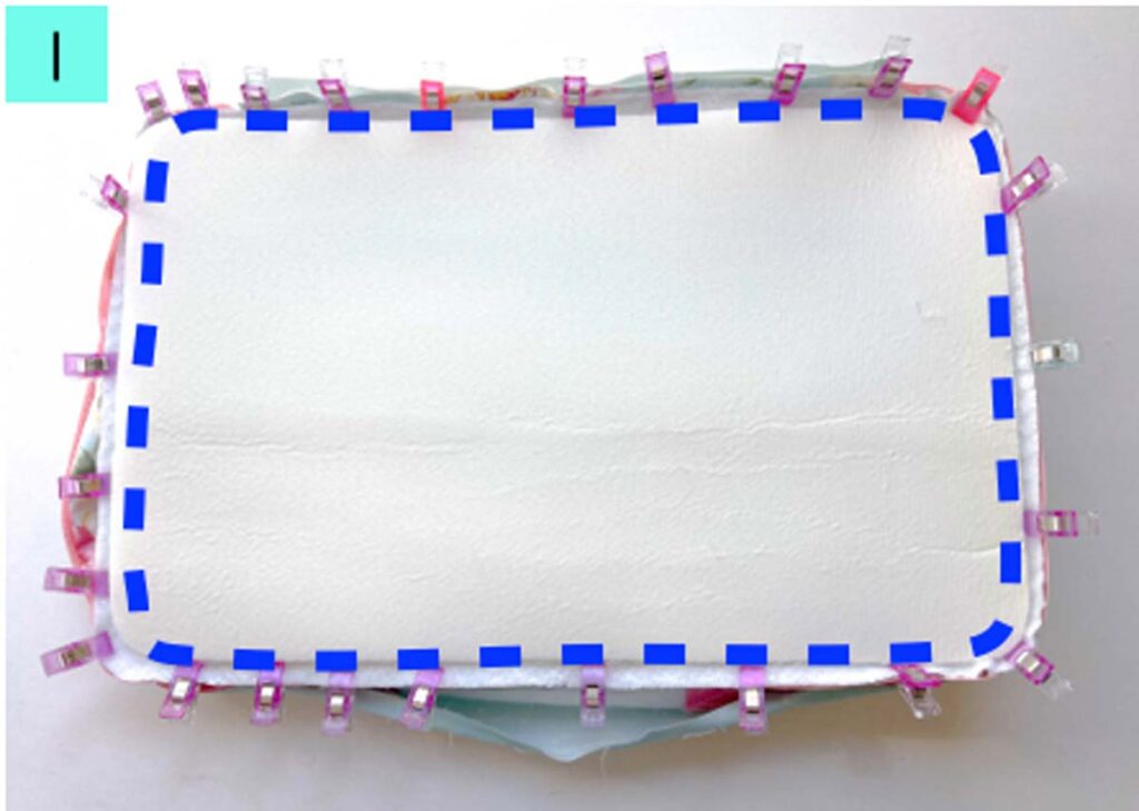 sewing lid piece to rest of carrier 
