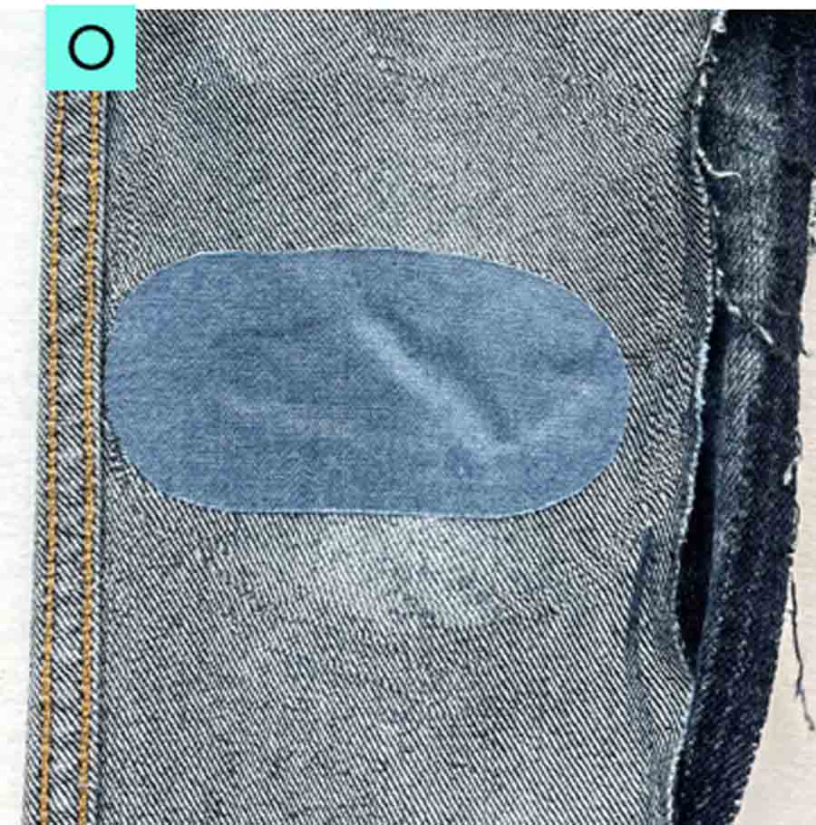 inside leg of jeans with denim patch attached. how to repair a hole in jeans