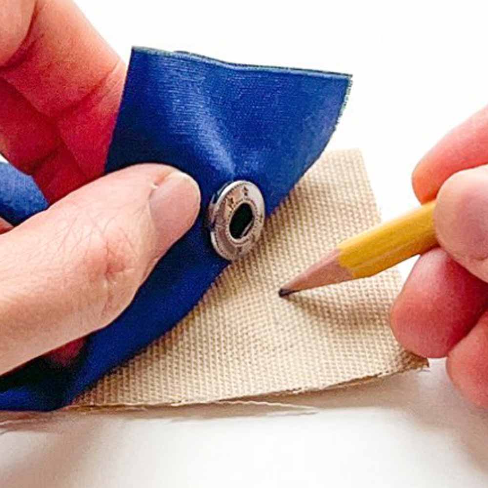 Step-by-step snap fastener installation tutorial - marking placement of snap stud on fabric