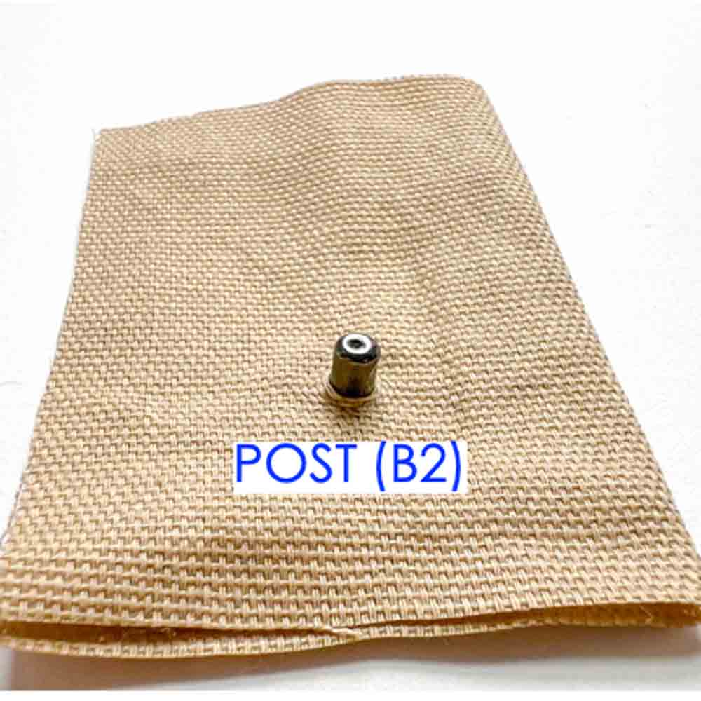 Step-by-step snap fastener installation tutorial - inserting snap post through hole in fabric. 