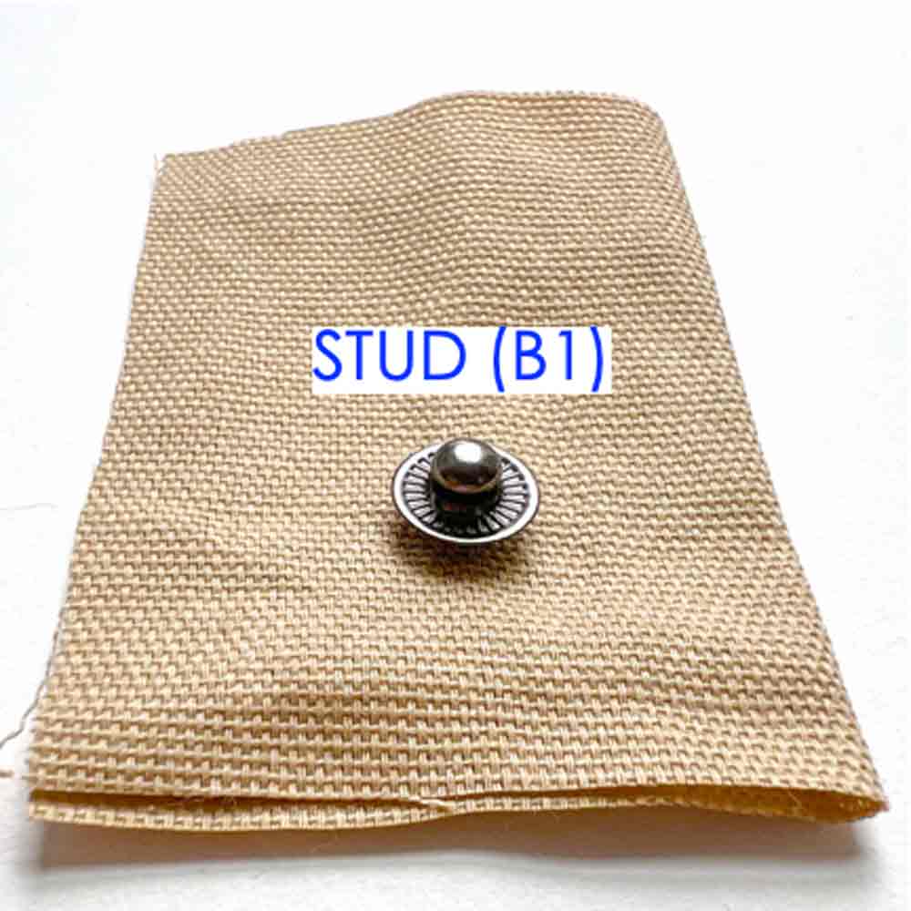 Step-by-step snap fastener installation tutorial - placing snap stud over snap post. How to install snaps to fabric