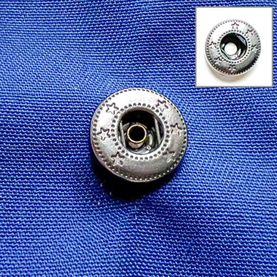 Step-by-step snap fastener installation tutorial - placing socket over snap prong. How to install snaps on fabric