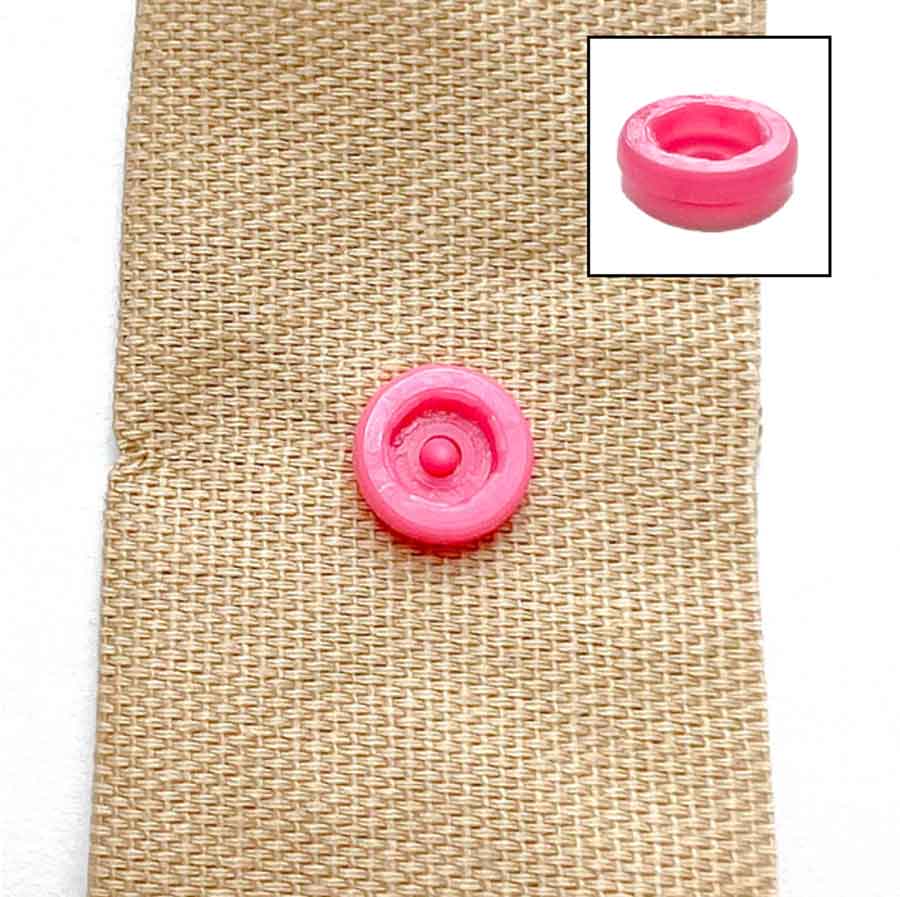 How to apply snaps to fabric using a snap press - inserting snap socket. 