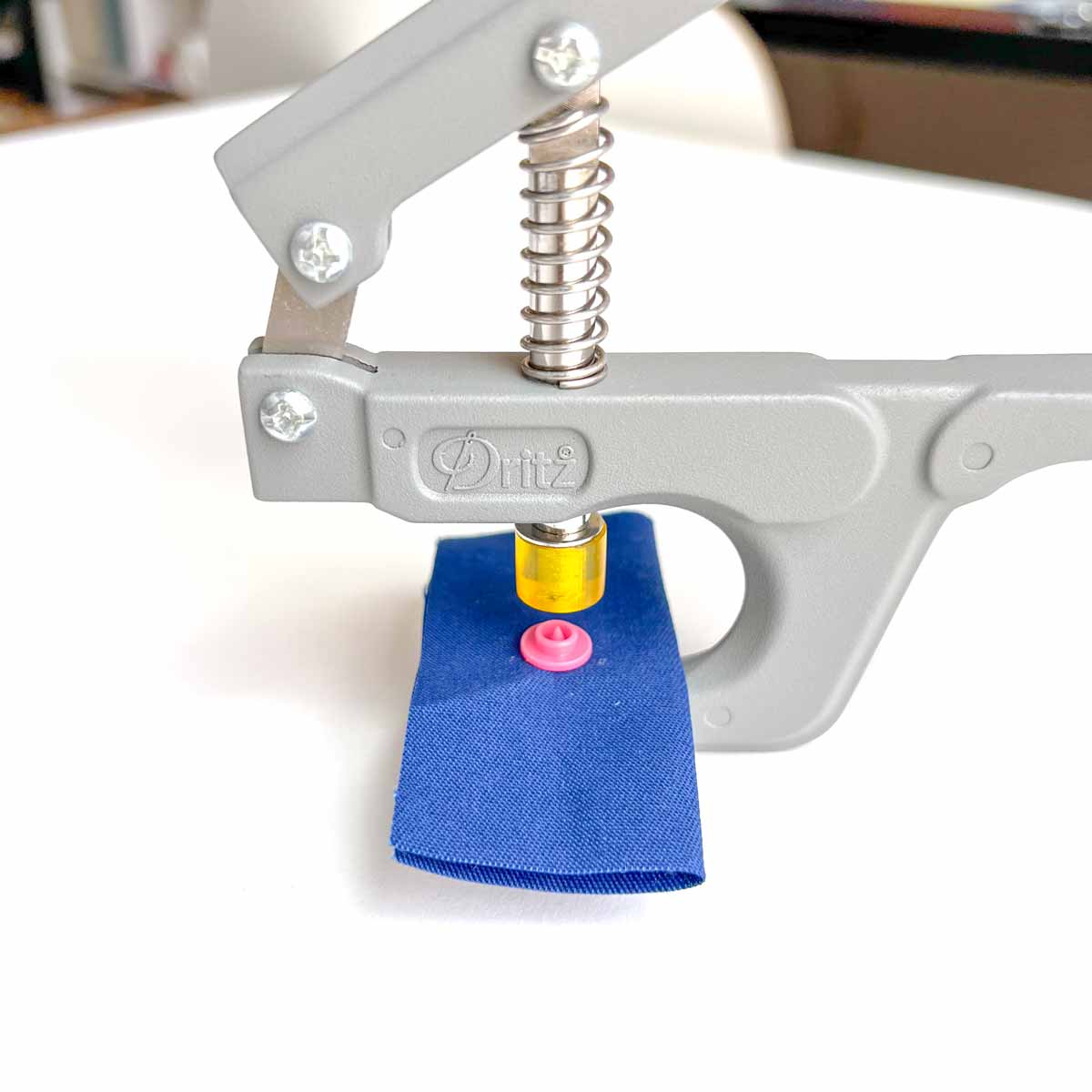 How to apply snaps to fabric using a snap press - snaps in snap press. How to install snaps to fabric. 