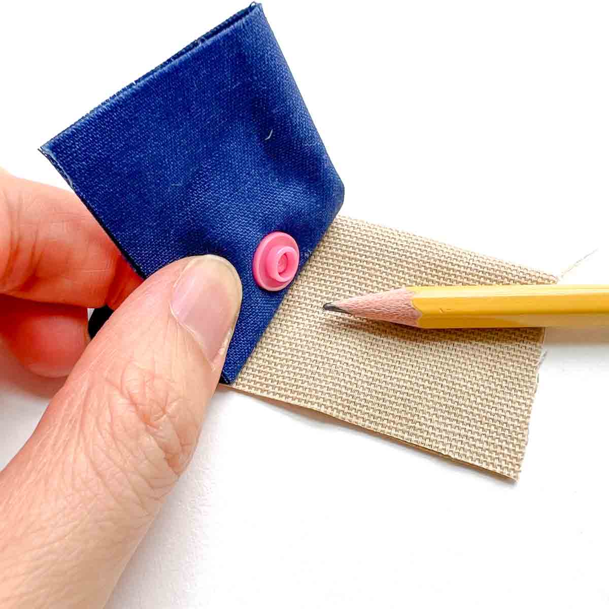 How to apply snaps to fabric using a snap press - marking other side of snap placement on fabric. 