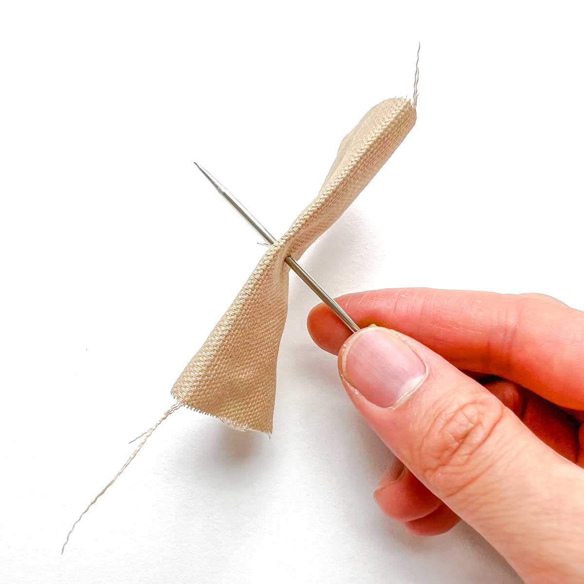 How to apply snaps to fabric using a snap press - poking hole through fabric 