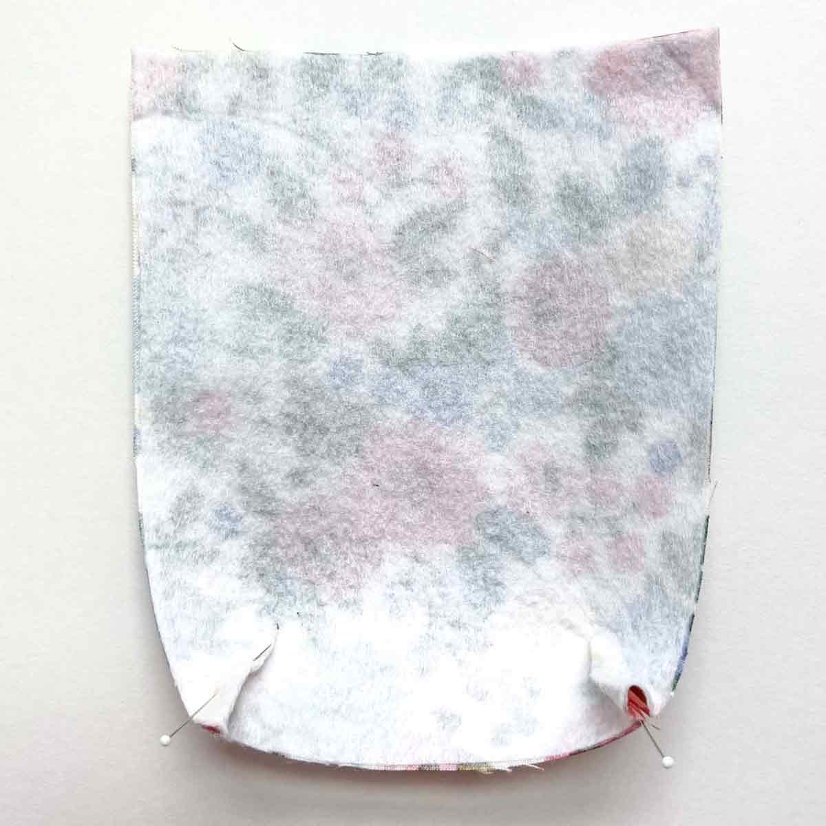 sewing darts on front pocket of crossbody cellphone bag