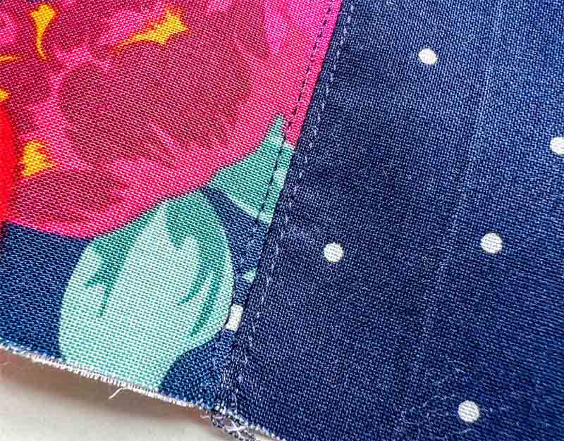 close up view of edge stitch on composition notebook cover