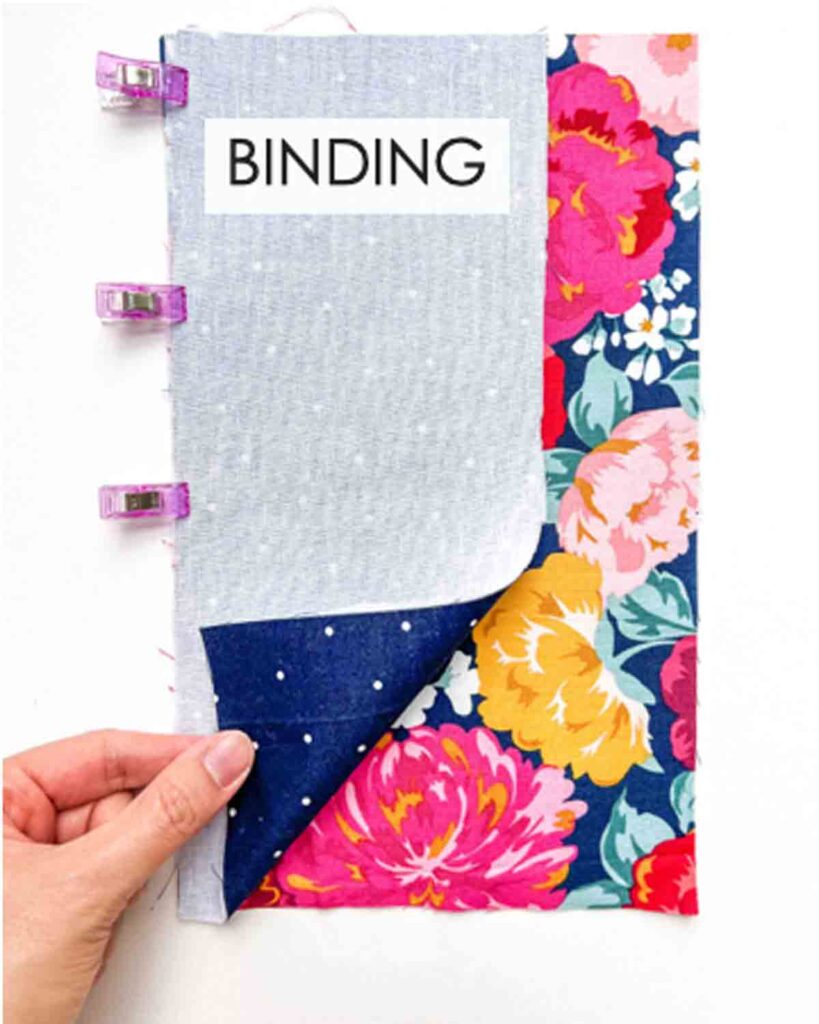 binding and front right sides together, clipped on left side