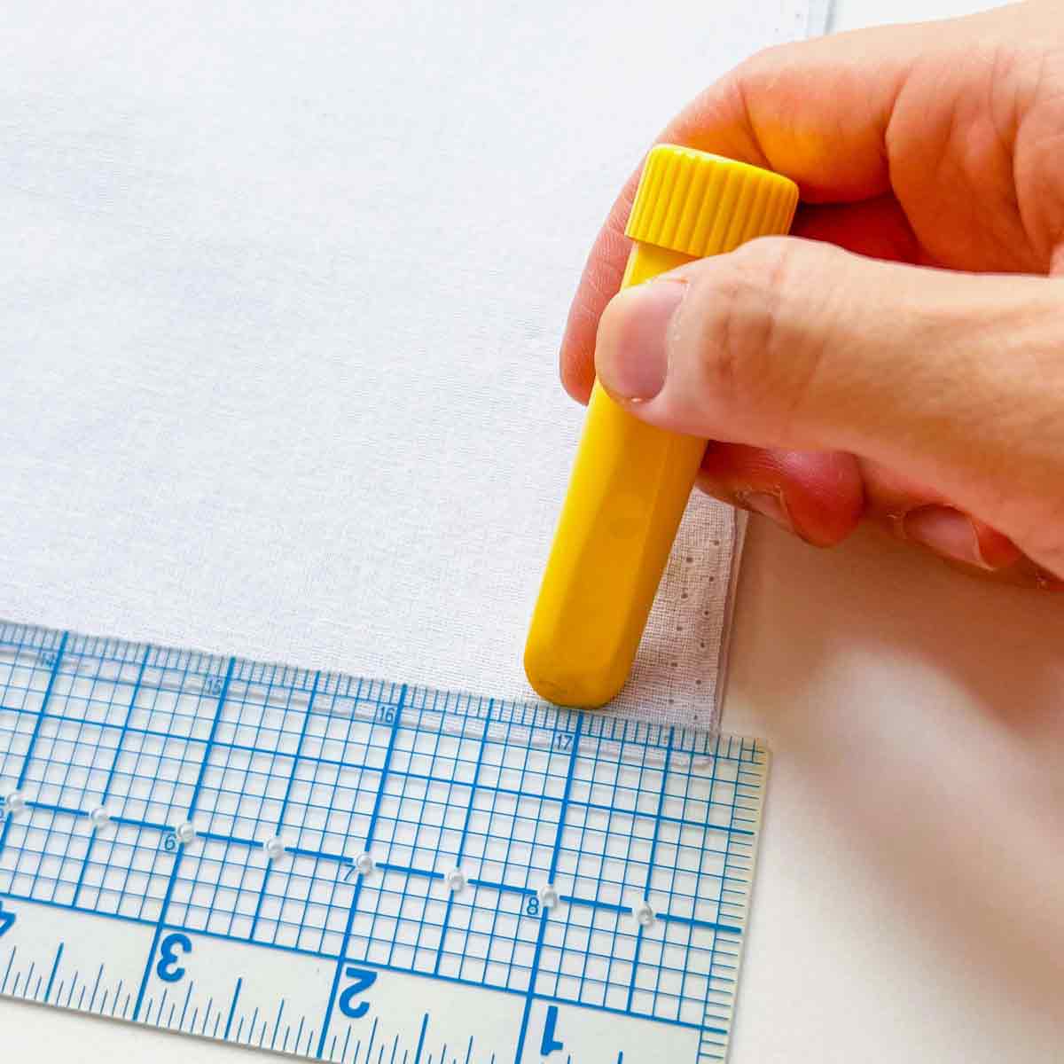 marking sew line with quilter's chalk and clear ruler on wrong side of LINING