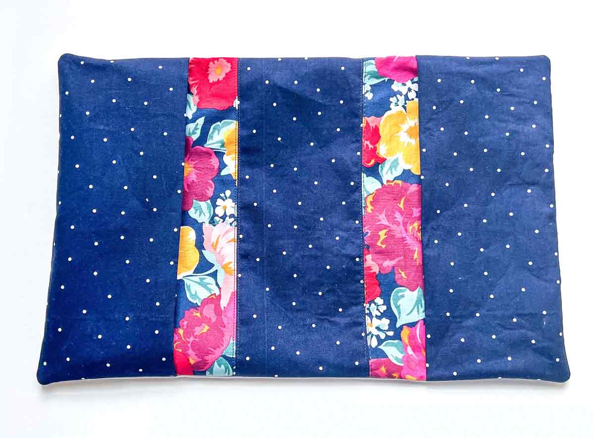 notebook cover complete, with inner flaps still flipped to the exterior side. 