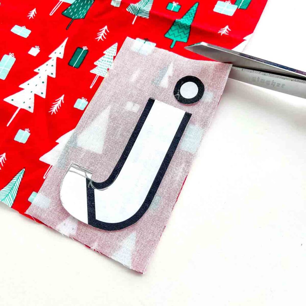 cutting out contrasting fabric according to interfacing
